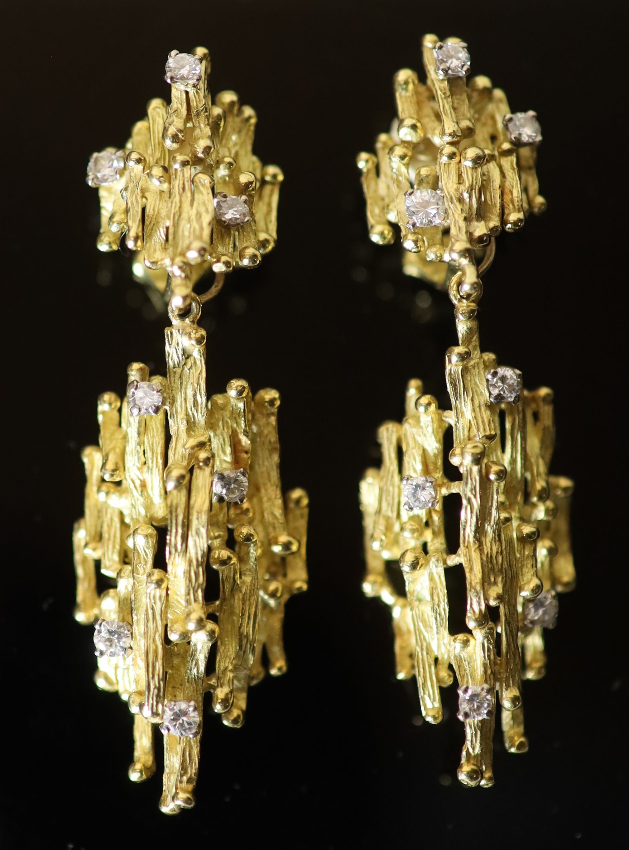 A pair of early 1970s 18ct gold and seven stone diamond set modernist rustic drop ear clips, by Alan Martin Gard,